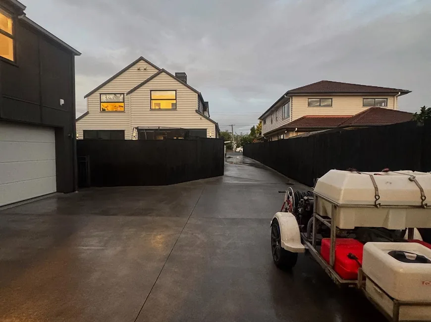 Dirty driveway with stains and moss